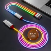 Colorful LED charging cable with a USB connector on a dark surface.